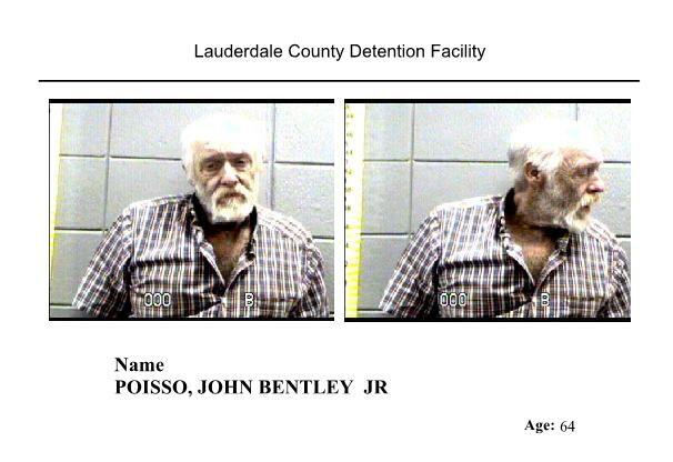 White male with gray hair beard and plaid shirt taking mugshot after arrest