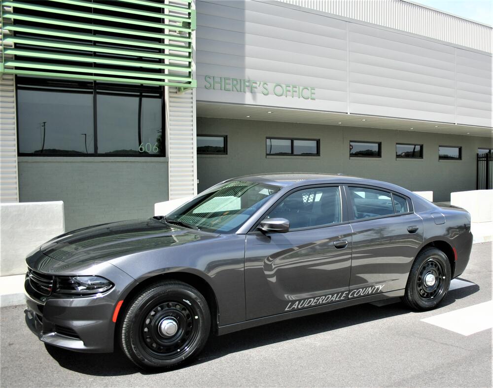 Gray Dodge Charger for inmate transport